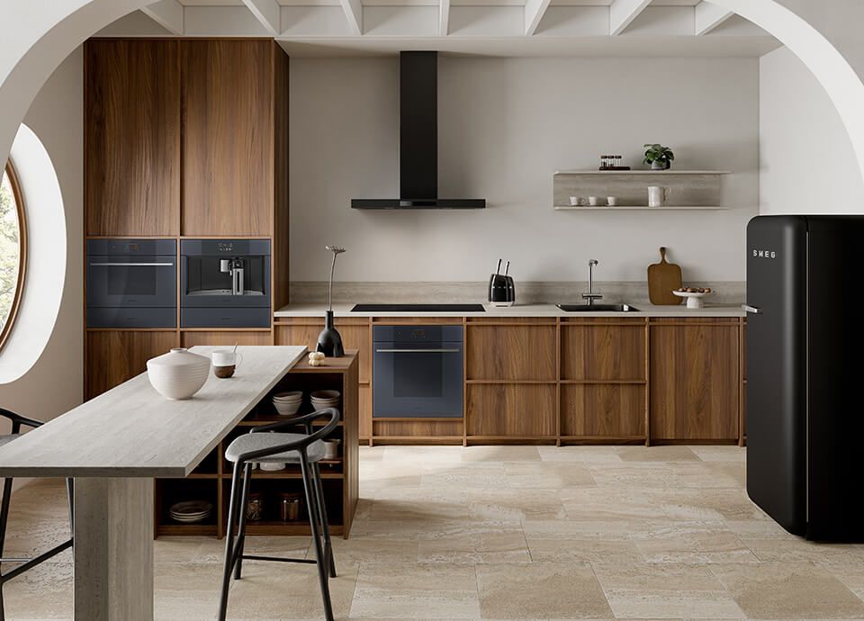 Elegant kitchen with black smeg appliances