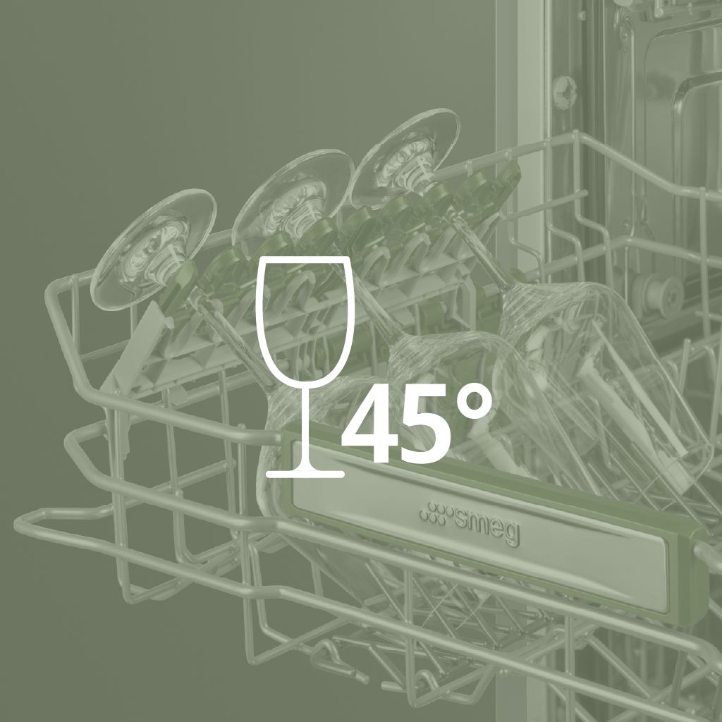 A wine glass with a 45° symbol in front. In the background, wine glasses are secured in the lower basket of a dishwasher
