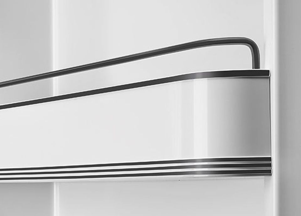 Refrigerator interior with black accents.