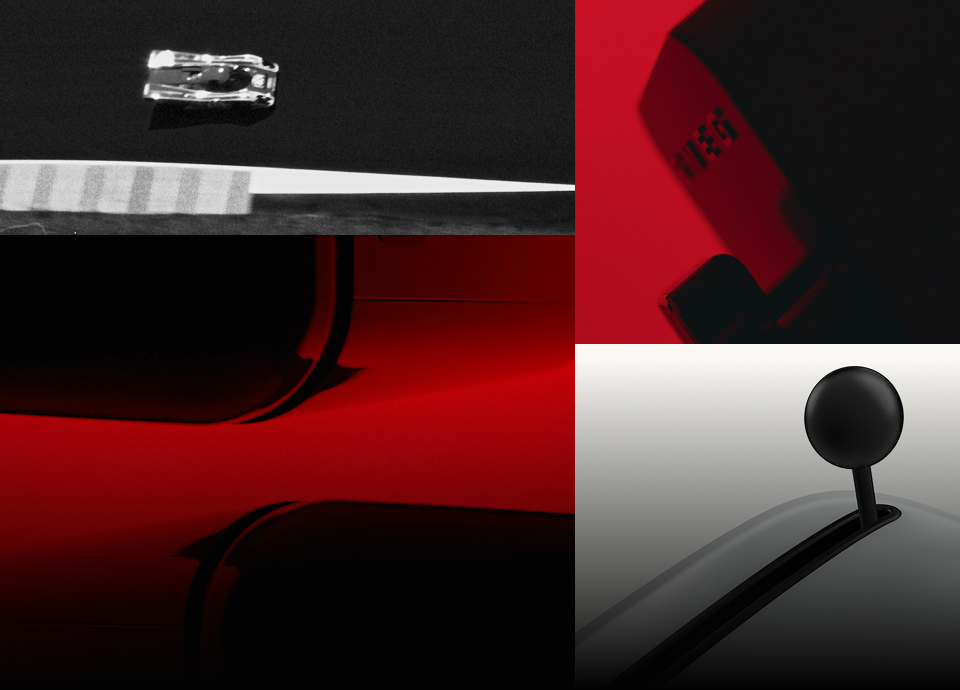 A visually compelling composition blending black and white with red accents. The image features a partial view of a Porsche 917 KH race car, subtly emerging from the monochrome background. Surrounding the car are Smeg products, including recognizable design elements and details, all integrated into the scene with a sleek and modern aesthetic. The red highlights draw attention to key features, creating a dynamic contrast that emphasizes the fusion of automotive heritage and premium home appliances.