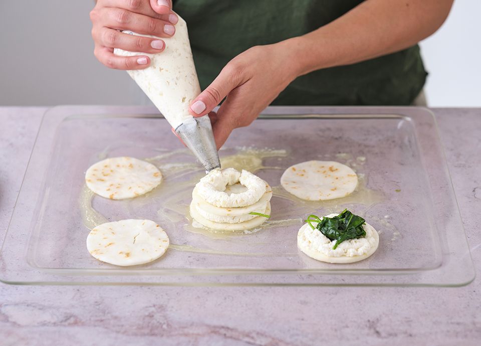 Millefeuille of celeriac gratin, ricotta cheese, spinach and parmesan chips