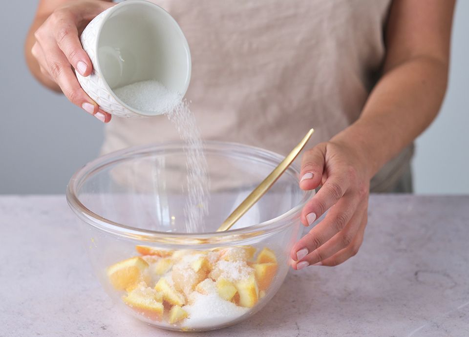 Crispy orange cannoli with chantilly cream, orange compote and meringues