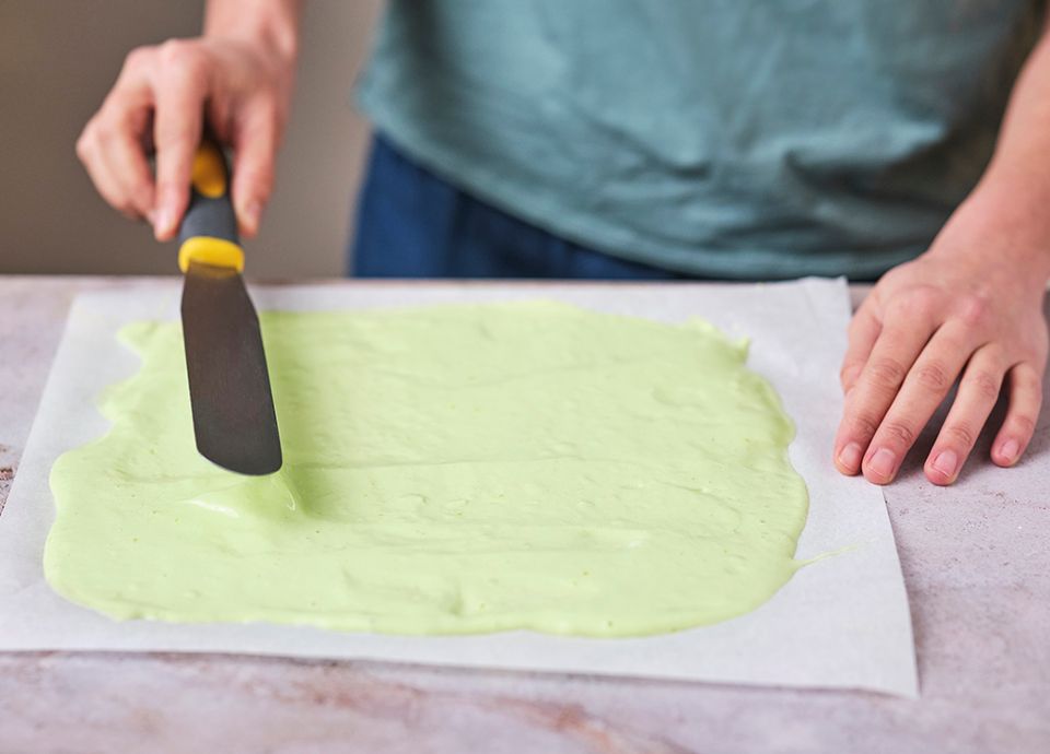Matcha tea sponge cake with fresh lime cheese cream and strawberry jam